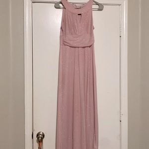 In perfect condition, great for formals or dances. And it is sparkling.